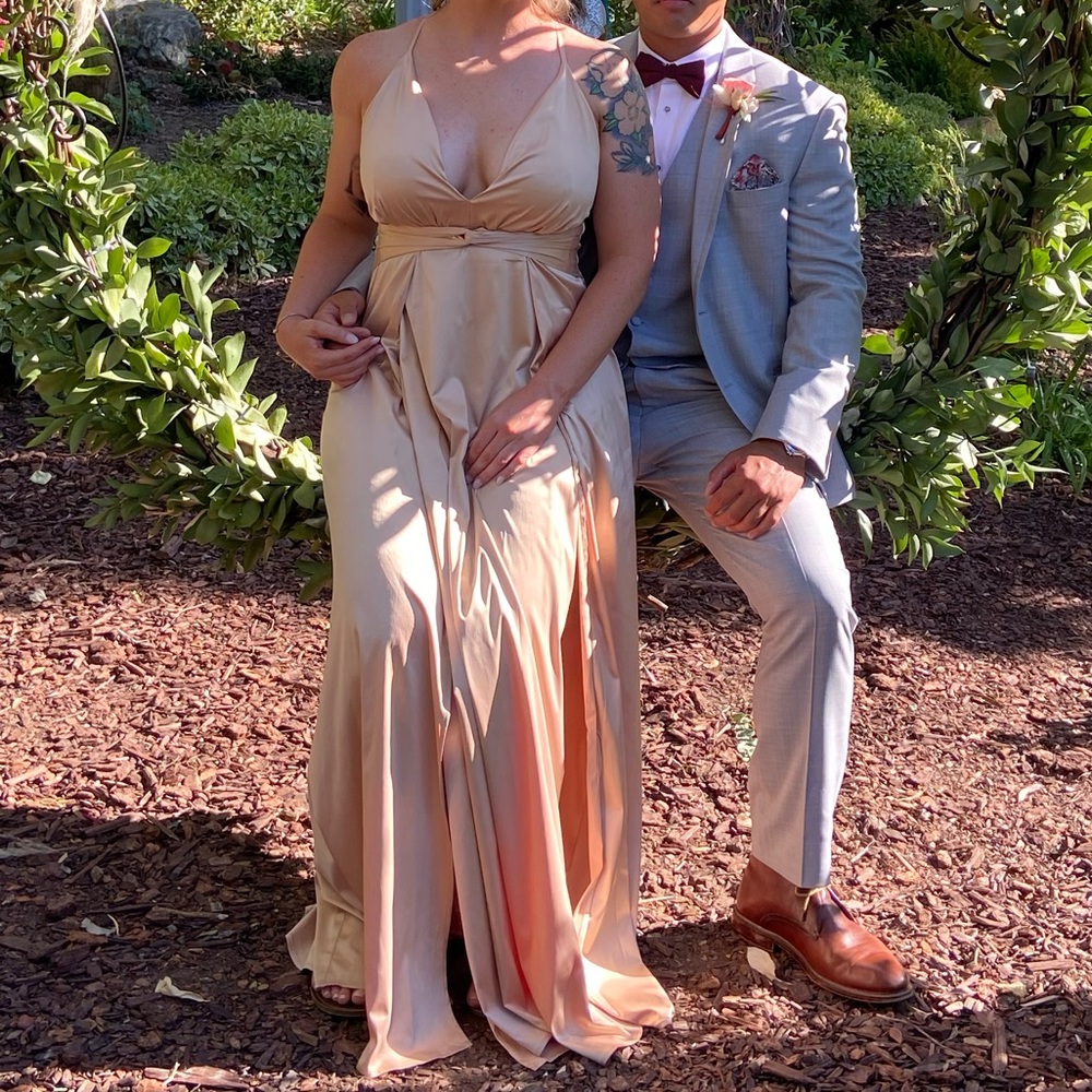 Beginning Boutique champagne bridesmaid gown